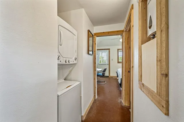 a view of hallway with washer and dryer