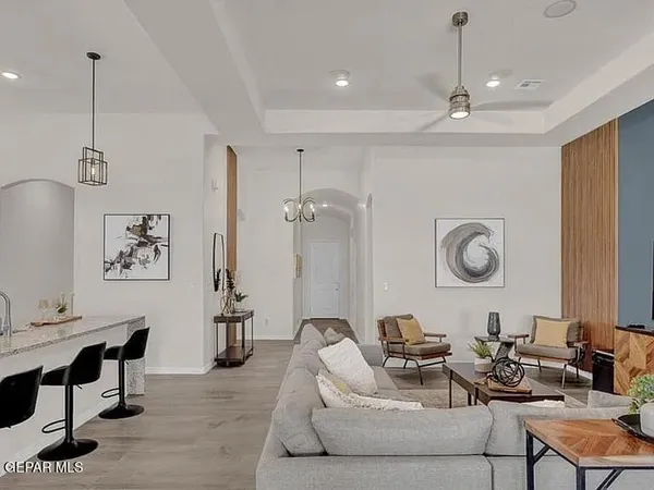 a living room with patio furniture