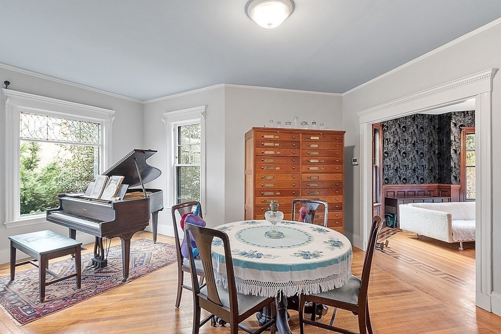 23 Wellesley Park Boston, MA 02124 - Photo 16 of 42 a view of a dining room with furniture window and wooden floor