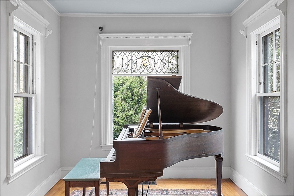 23 Wellesley Park Boston, MA 02124 - Photo 17 of 42 a living room with furniture and a window