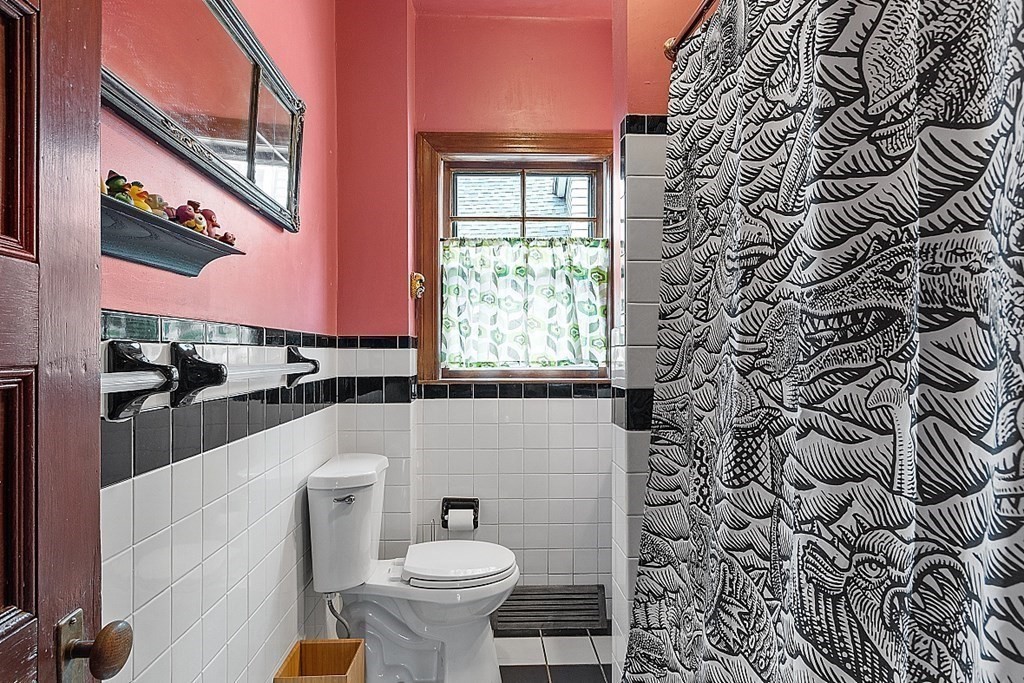 23 Wellesley Park Boston, MA 02124 - Photo 38 of 42 a bathroom with a toilet and a sink