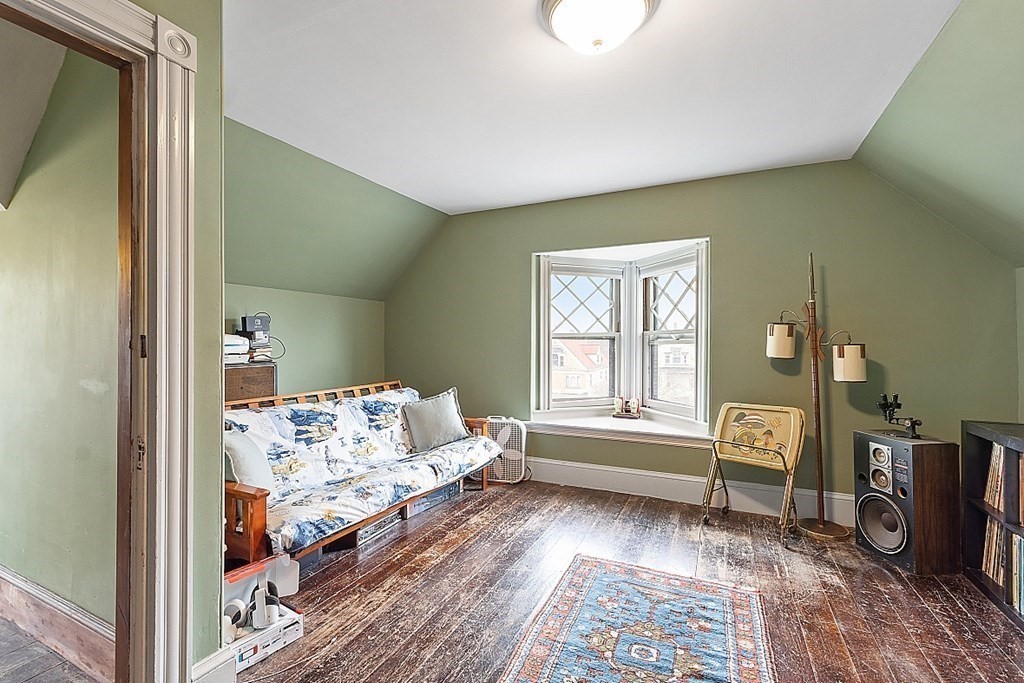 23 Wellesley Park Boston, MA 02124 - Photo 40 of 42 a living room with furniture and a window