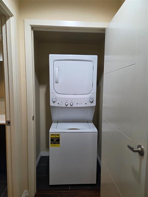 1100 West Trinity Mills Road, Unit 2014 Carrollton, TX 75006 - Photo 13 of 13 a utility room with dryer and washer