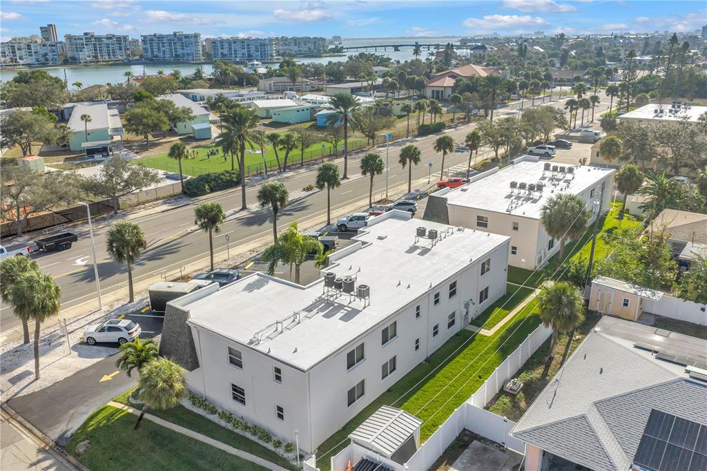 8630 Blind Pass Road, Unit 12 St. Pete Beach, FL 33706 - Photo 25 of 30 a view of a city from a terrace