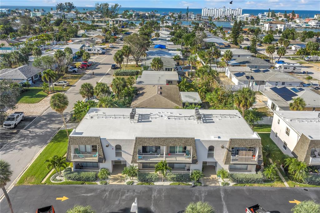 8630 Blind Pass Road, Unit 12 St. Pete Beach, FL 33706 - Photo 27 of 30 an aerial view of a house