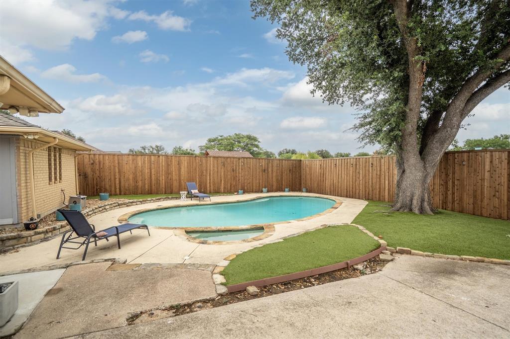 2214 Valley Mill Carrollton, TX 75006 - Photo 30 of 36 a view of a backyard with swimming pool
