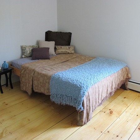 1 Juggler Meadow Road Leverett, MA 01054 - Photo 12 of 23 a bedroom with a bed and wooden floor