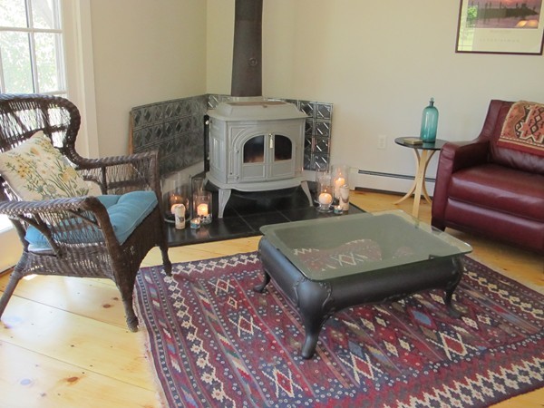 1 Juggler Meadow Road Leverett, MA 01054 - Photo 9 of 23 a living room with furniture and a fireplace