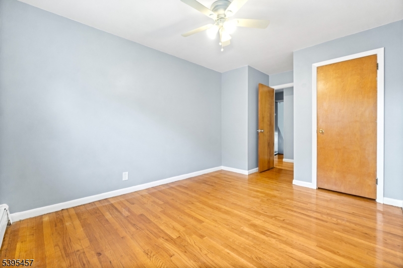 726 Gates Terrace Union, NJ 07083 - Photo 15 of 16 a view of an empty room with wooden floor