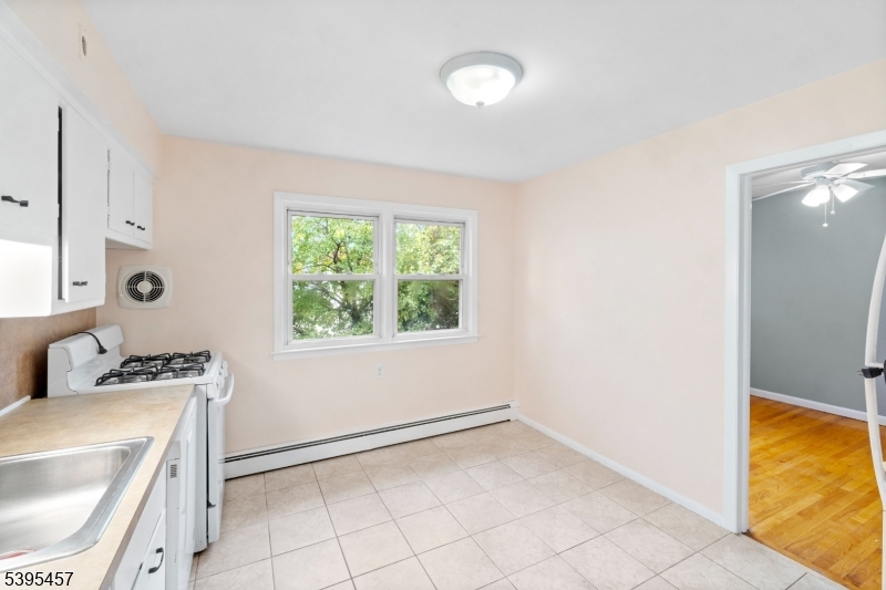 726 Gates Terrace Union, NJ 07083 - Photo 6 of 16 a view of storage and utility room with a window