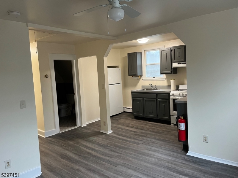 184 Main Street Andover, NJ 07821 - Photo 7 of 11 a kitchen with stainless steel appliances granite countertop a refrigerator and a sink