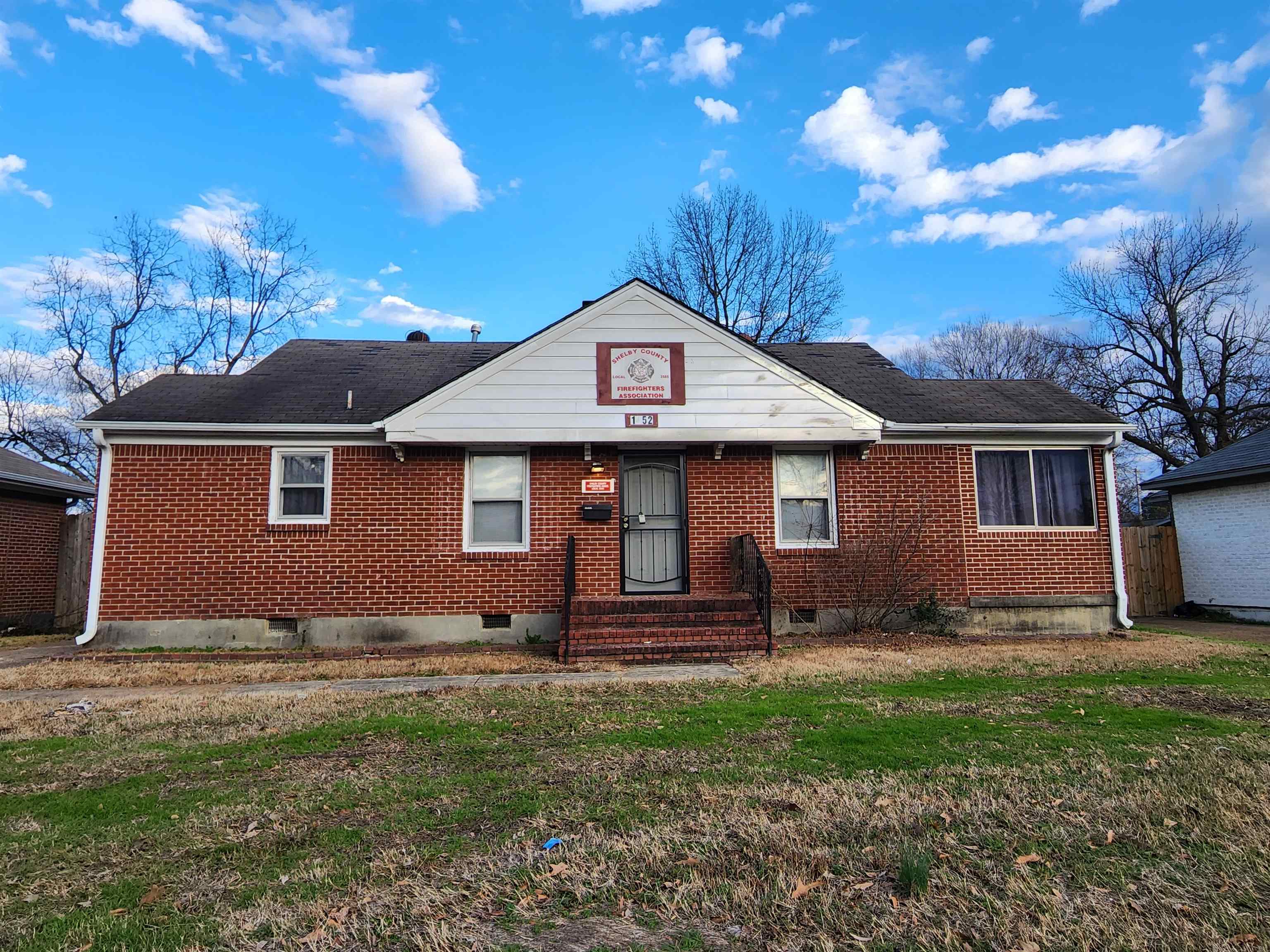 1452 South Perkins Road Memphis, TN 38117 - Photo 1 of 22 a view of a house with yard and a tree
