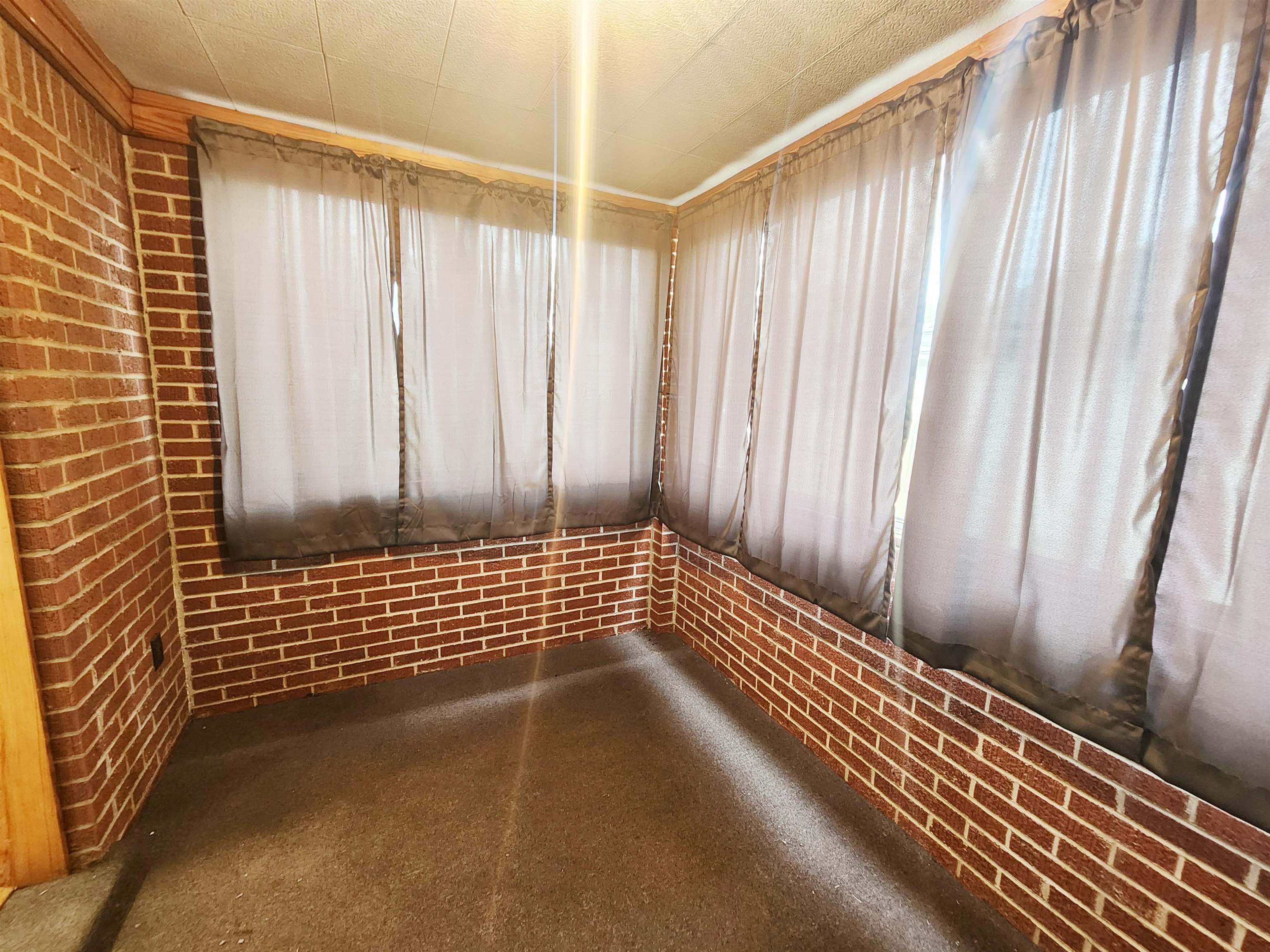 1452 South Perkins Road Memphis, TN 38117 - Photo 14 of 22 a view of a door with wooden floor