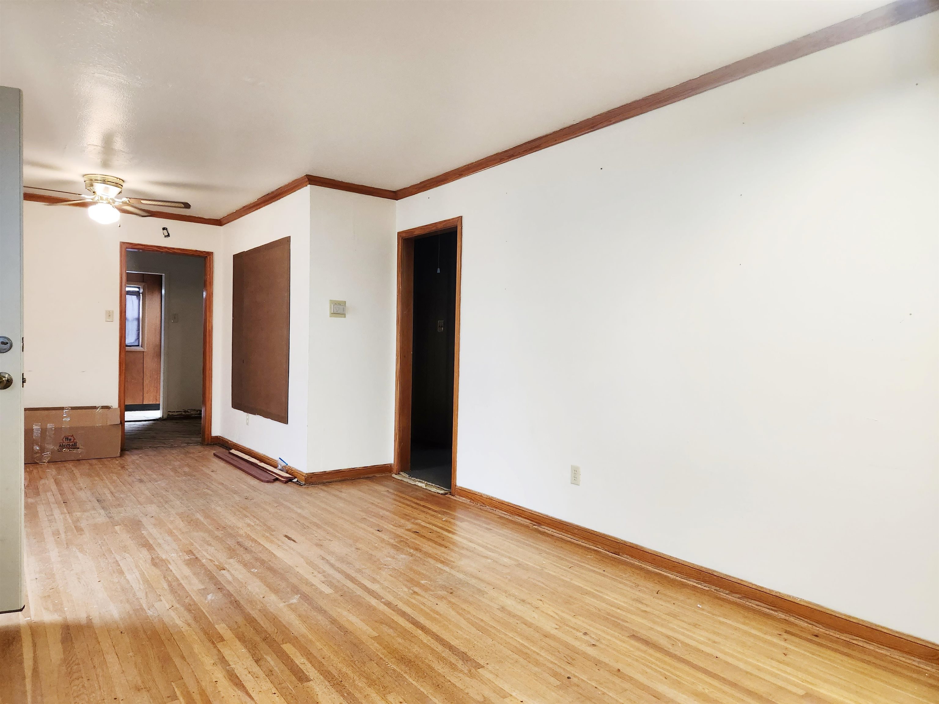 1452 South Perkins Road Memphis, TN 38117 - Photo 3 of 22 a view of an empty room with wooden floor