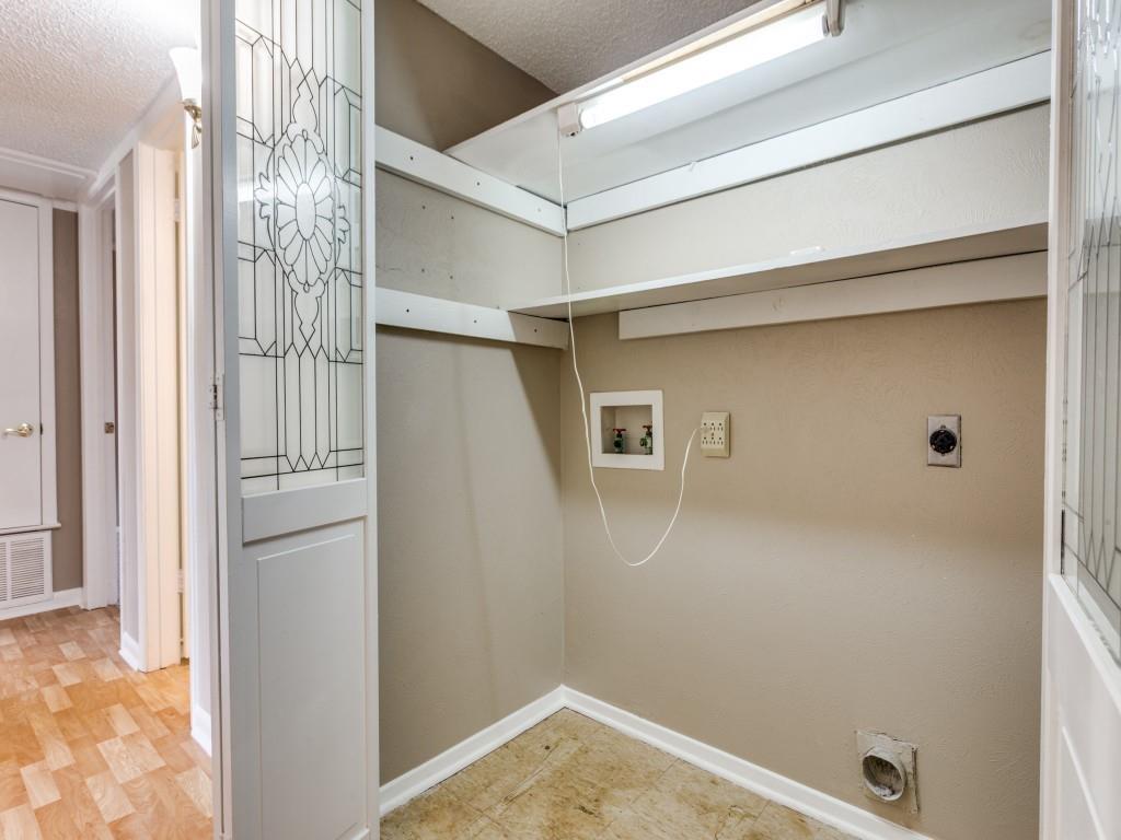 1216 Manning Street Benbrook, TX 76126 - Photo 17 of 26 Laundry room with a textured ceiling, hookup for an electric dryer, and washer hookup
