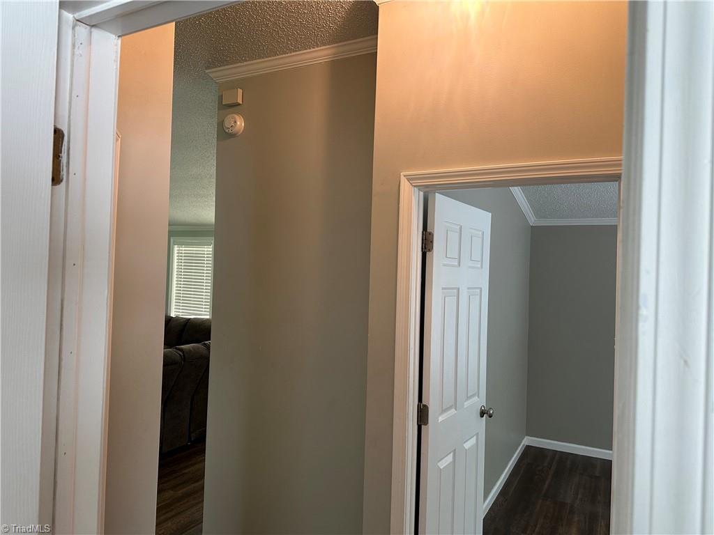 673 Joe Road Mocksville, NC 27028 - Photo 12 of 22 Hallway from bedrooms t to living room.