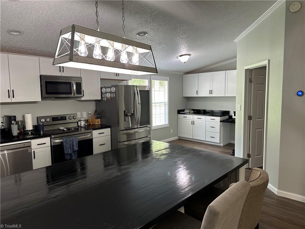 673 Joe Road Mocksville, NC 27028 - Photo 4 of 22 Looking from the Living Room into the kitchen
