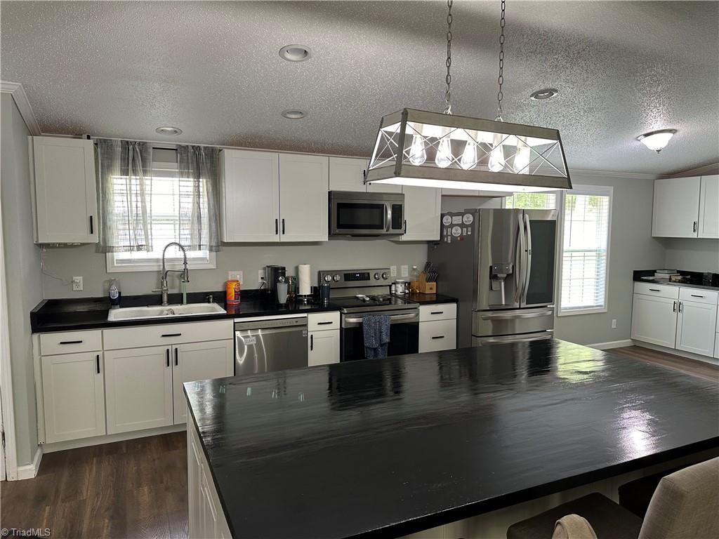 673 Joe Road Mocksville, NC 27028 - Photo 5 of 22 Kitchen and large island with built in charge ports