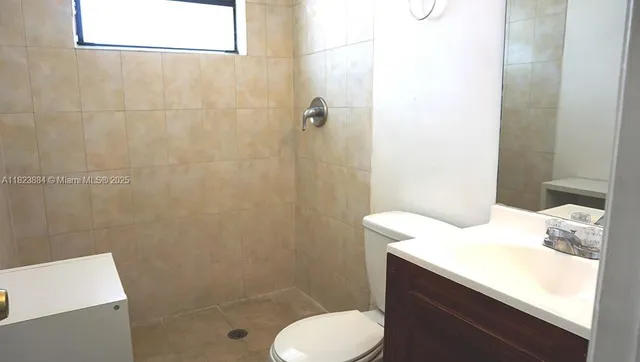 a view of a room that has a window