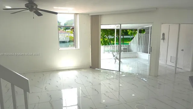 a view of a room with a outdoor space