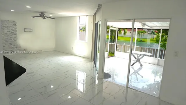 a view of an empty room and window