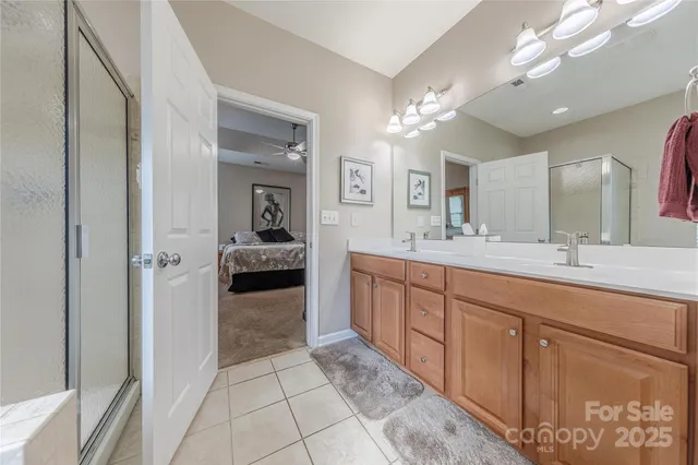 a bathroom with a sink a vanity and a mirror