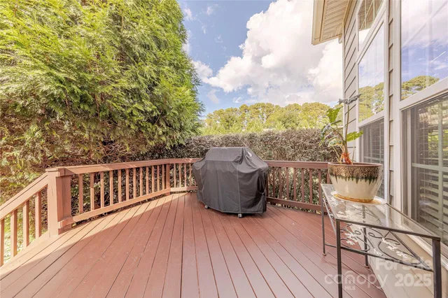 a view of balcony with furniture