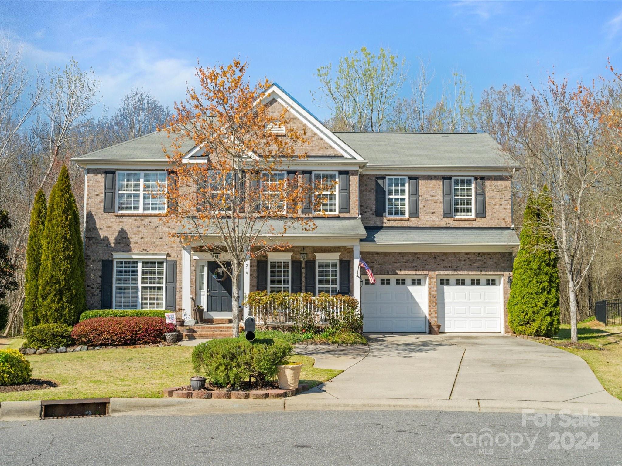 219 Clear Spring Court Fort Mill, SC 29708 - Photo 1 of 38 front view of a house with a yard