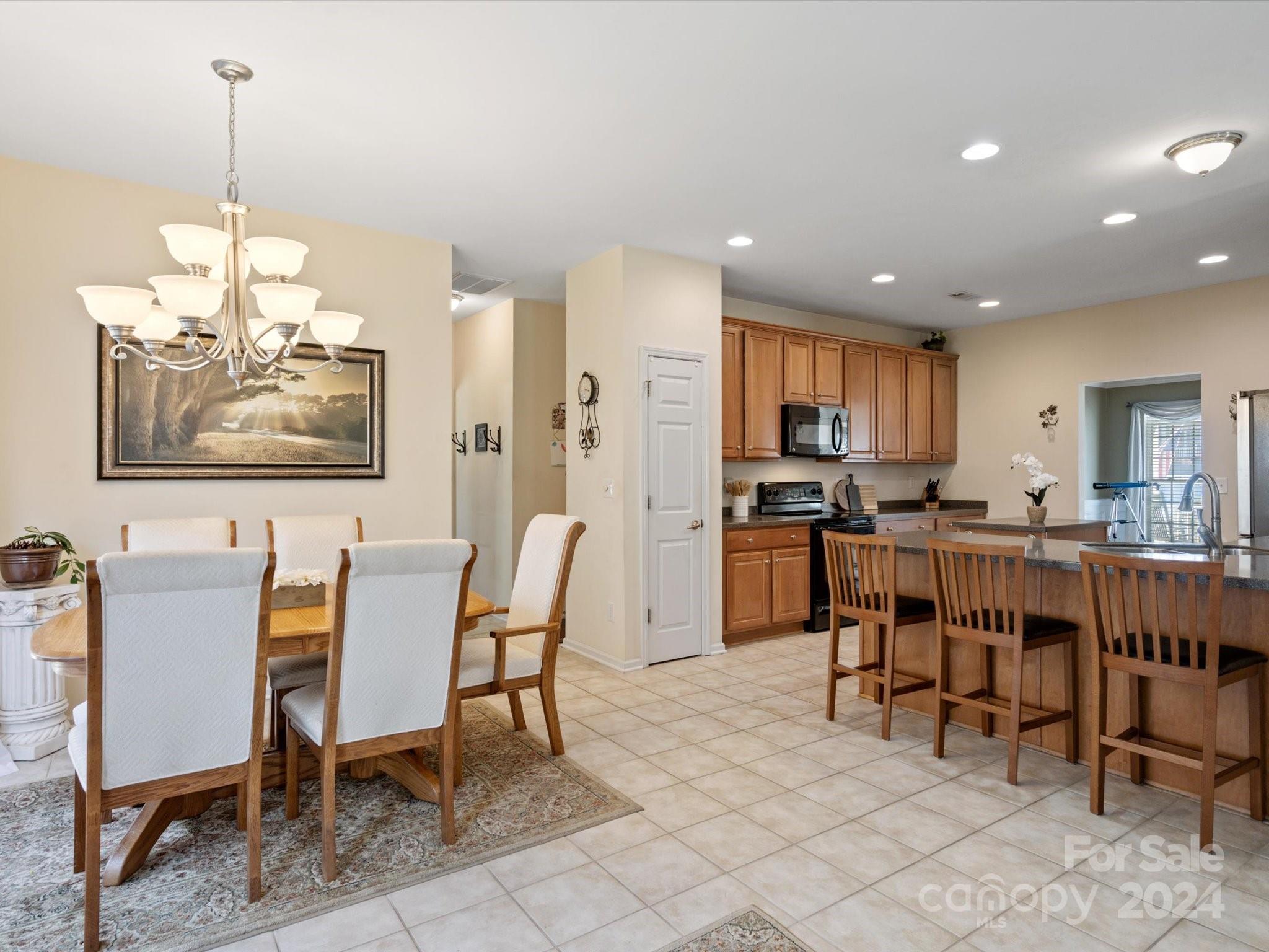 219 Clear Spring Court Fort Mill, SC 29708 - Photo 11 of 38 a view of a dining room with furniture