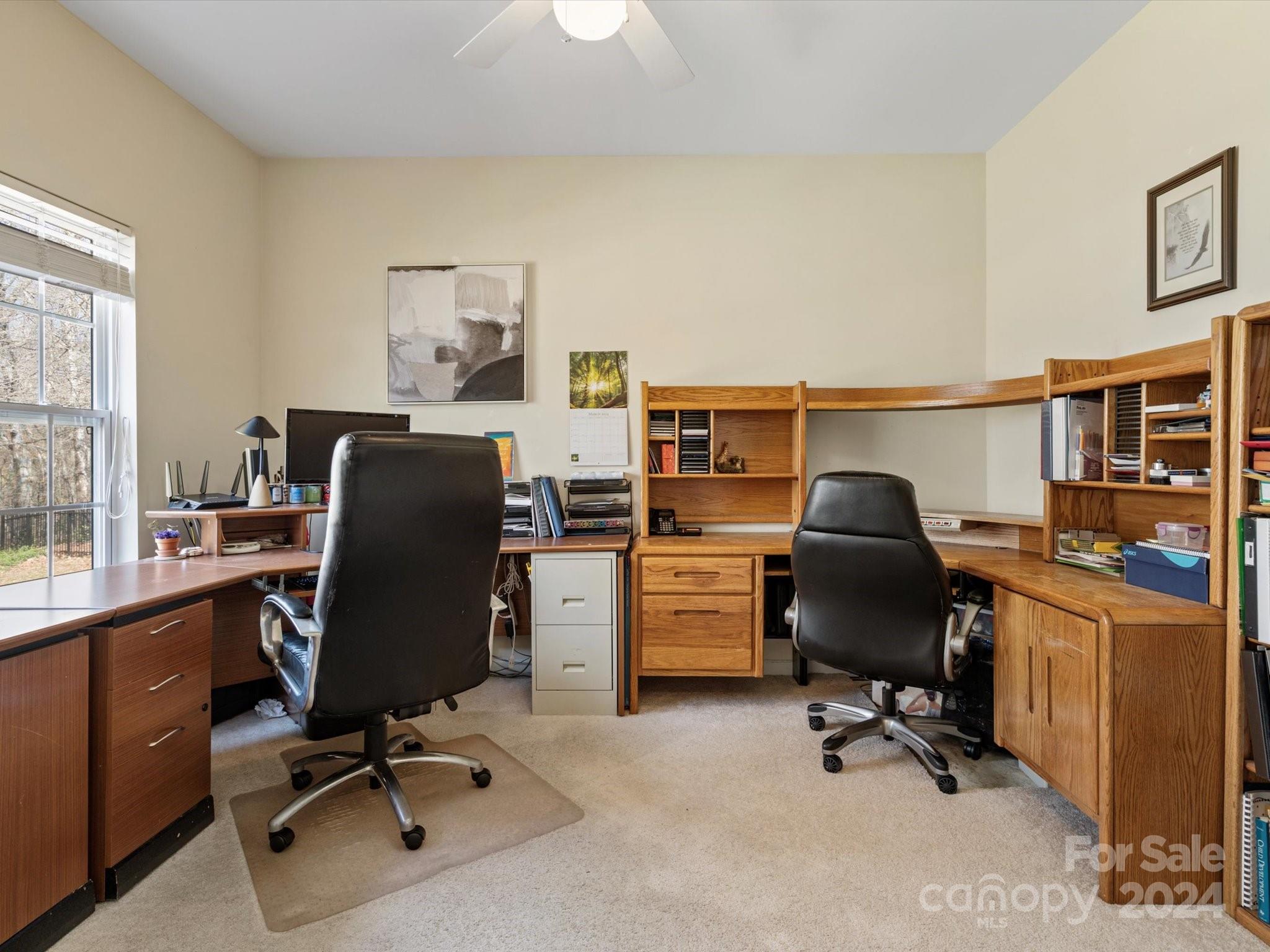 219 Clear Spring Court Fort Mill, SC 29708 - Photo 24 of 38 a view of a workspace with furniture and a window