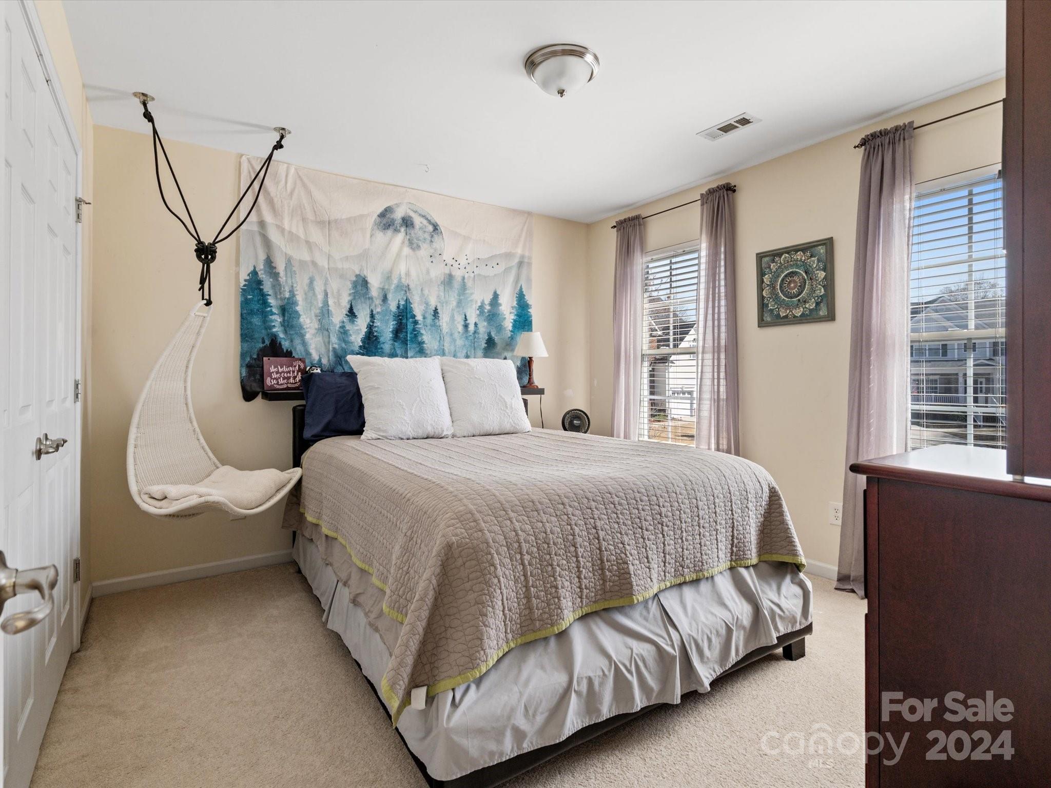 219 Clear Spring Court Fort Mill, SC 29708 - Photo 25 of 38 a bedroom with a bed and a window