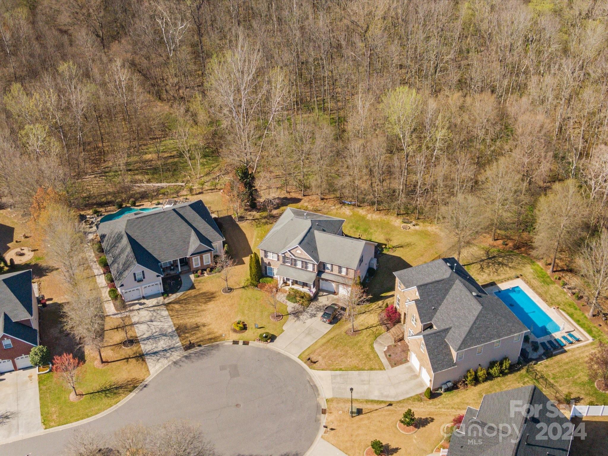 219 Clear Spring Court Fort Mill, SC 29708 - Photo 31 of 38 an aerial view of a house with swimming pool