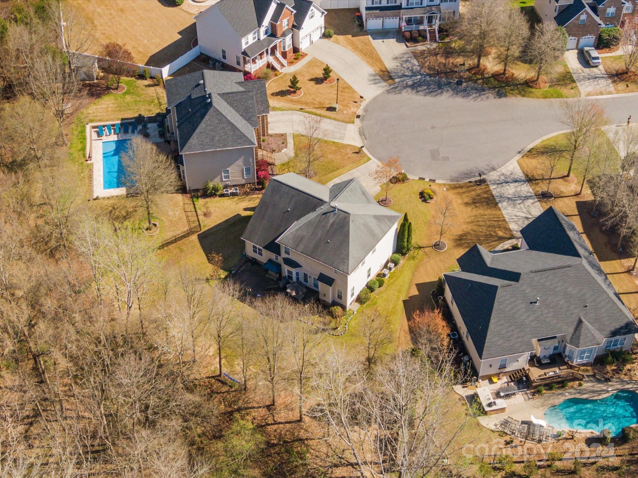 219 Clear Spring Court Fort Mill, SC 29708 - Photo 33 of 38 an aerial view of residential houses with outdoor space