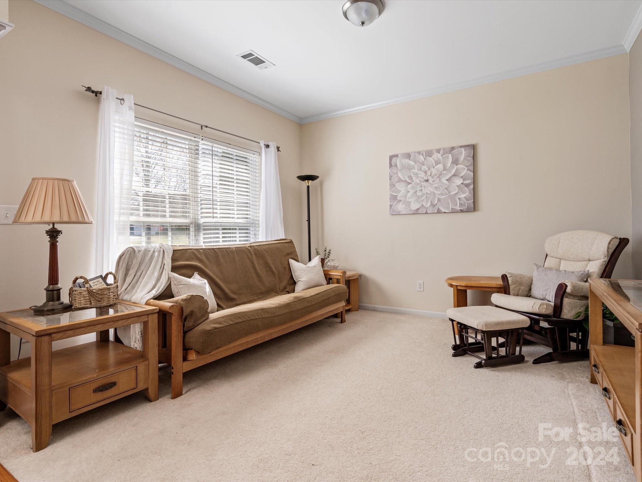 219 Clear Spring Court Fort Mill, SC 29708 - Photo 5 of 38 a living room with furniture and a window