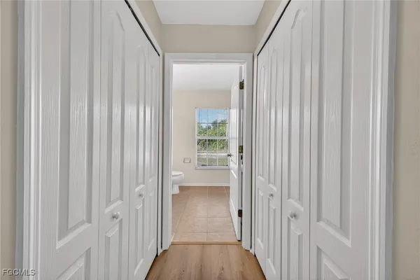 a view of a bathroom from the hallway