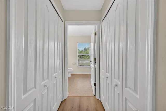 a view of a bathroom from the hallway