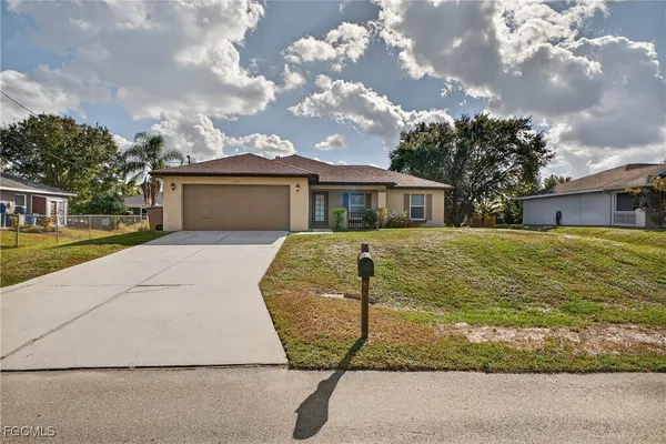 a view of a house with entertaining space