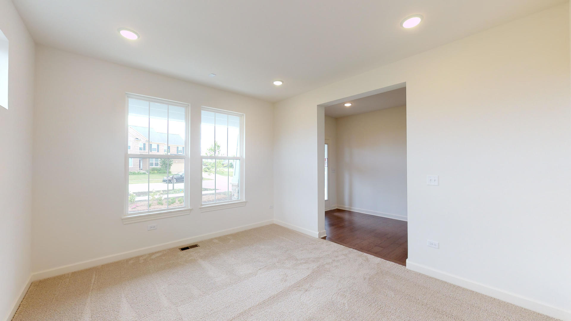 4335 Little Leaf Road Naperville, IL 60564 - Photo 2 of 13 a view of an empty room with a window