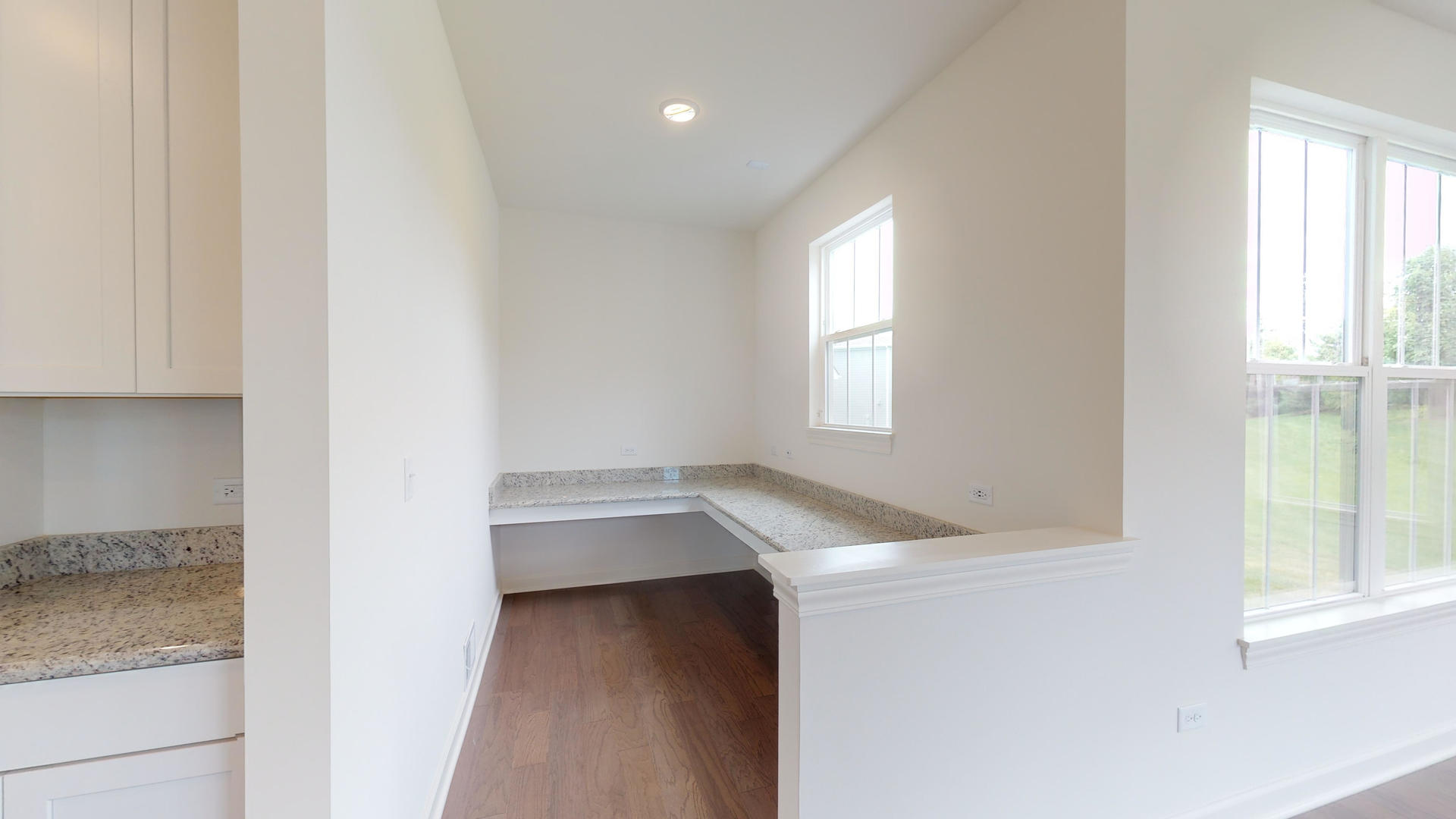 4335 Little Leaf Road Naperville, IL 60564 - Photo 8 of 13 a view of kitchen and hall with wooden floor