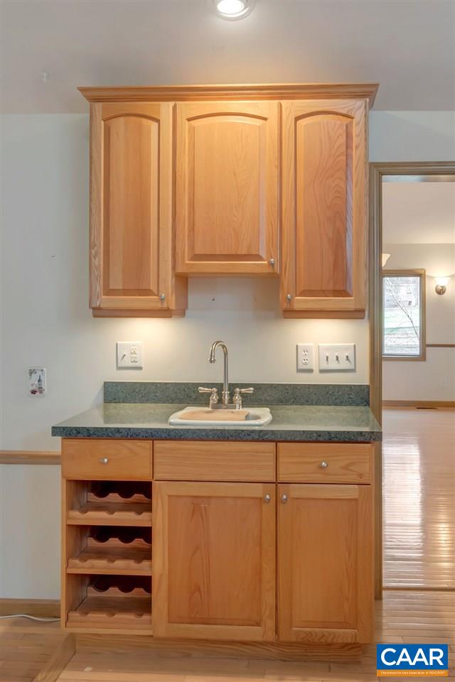 9 Out Of Bounds Road Palmyra, VA 22963 - Photo 11 of 37 a kitchen with granite countertop cabinets appliances and a counter top