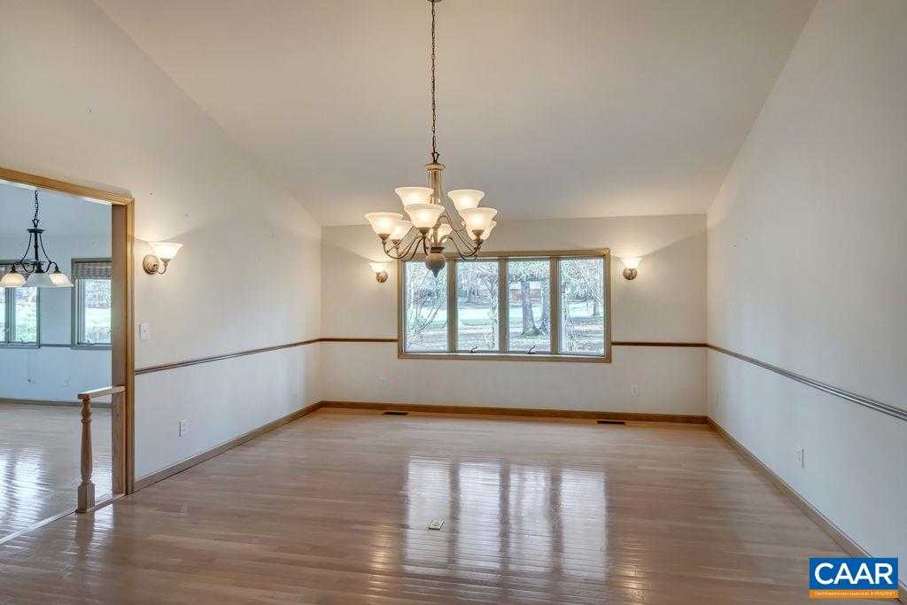 9 Out Of Bounds Road Palmyra, VA 22963 - Photo 17 of 37 a view of a room with wooden floor and a window