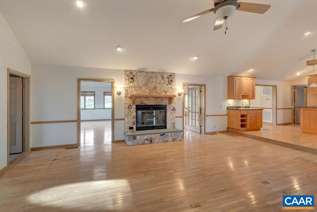 9 Out Of Bounds Road Palmyra, VA 22963 - Photo 4 of 37 a view of a room with kitchen and fireplace