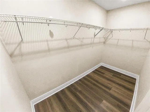 a view of a room with racks on the wall