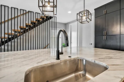 a view of a living room and entryway