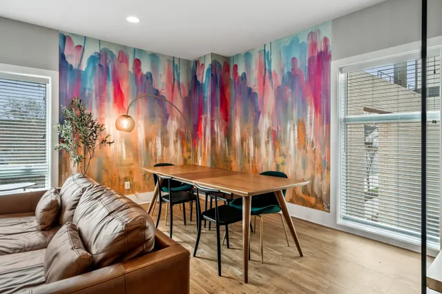 a view of a livingroom with furniture and window