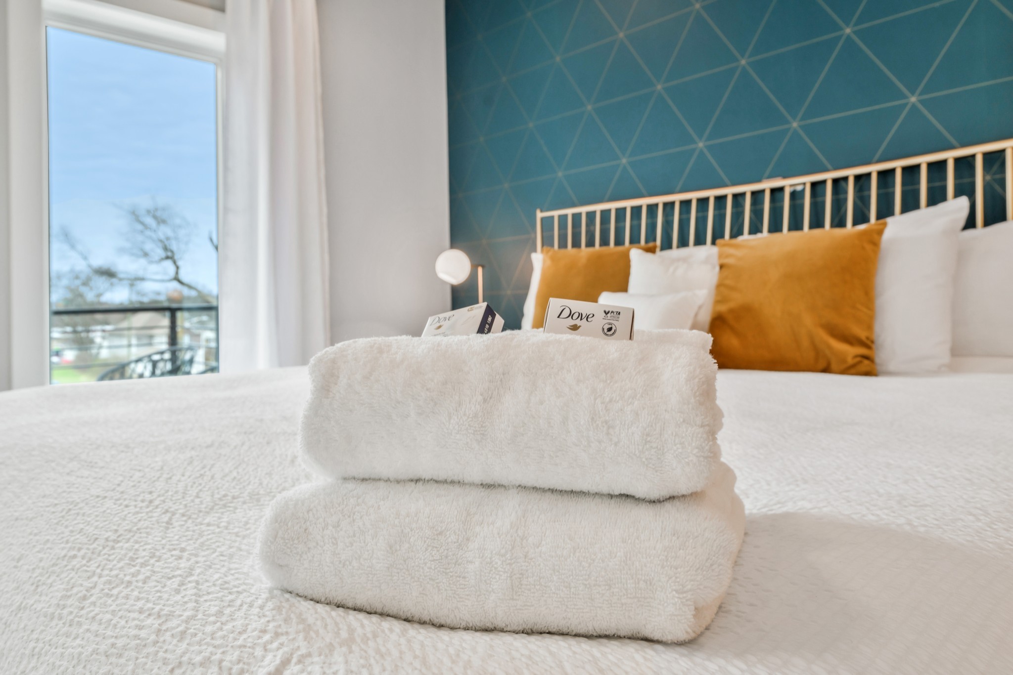 705 27th Avenue North Nashville, TN 37209 - Photo 26 of 41 a large white bed sitting in a bedroom next to a window