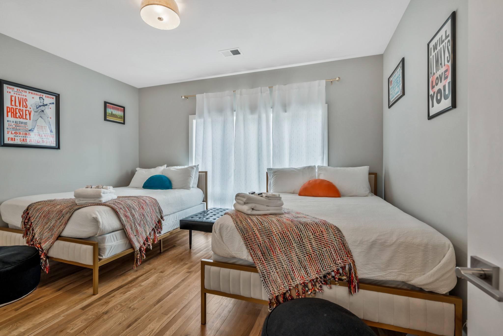 705 27th Avenue North Nashville, TN 37209 - Photo 34 of 41 a bedroom with two beds and wooden floor