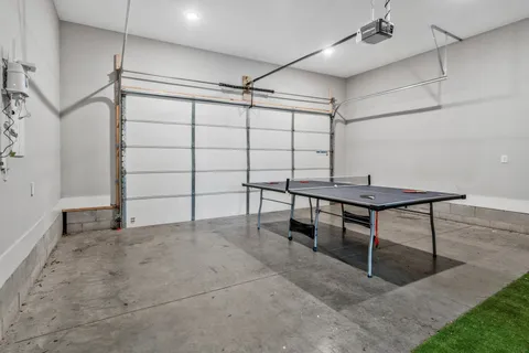 a view of a room with table and a table