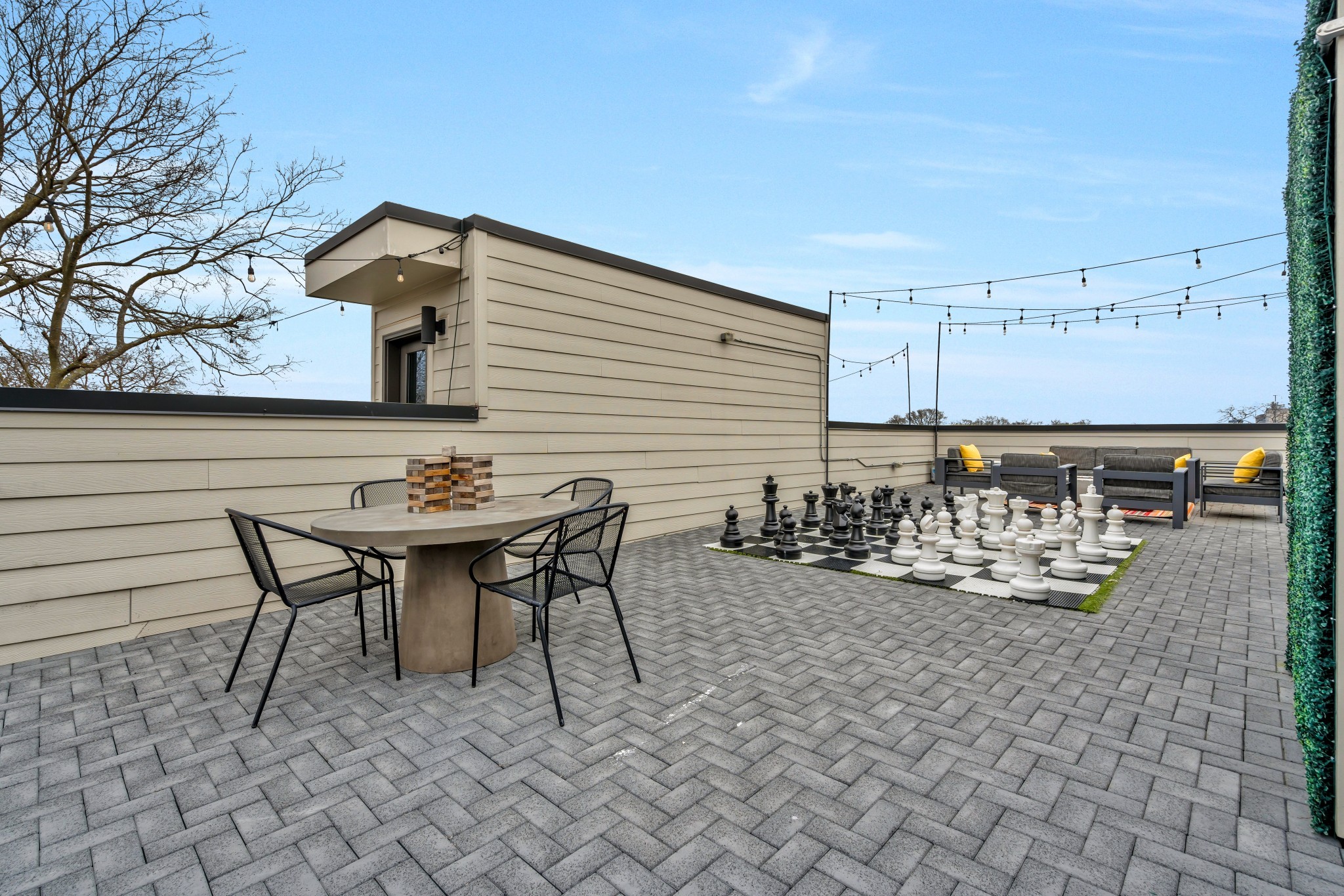 705 27th Avenue North Nashville, TN 37209 - Photo 39 of 41 a backyard of a house with table and chairs