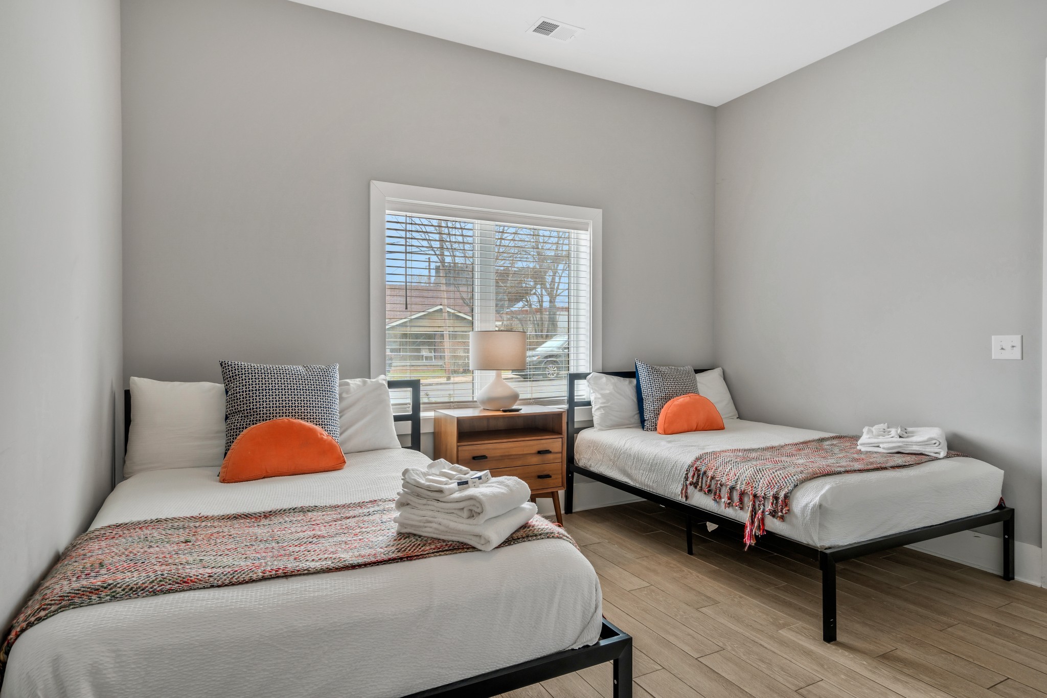 705 27th Avenue North Nashville, TN 37209 - Photo 5 of 41 a bedroom with two beds and a large window